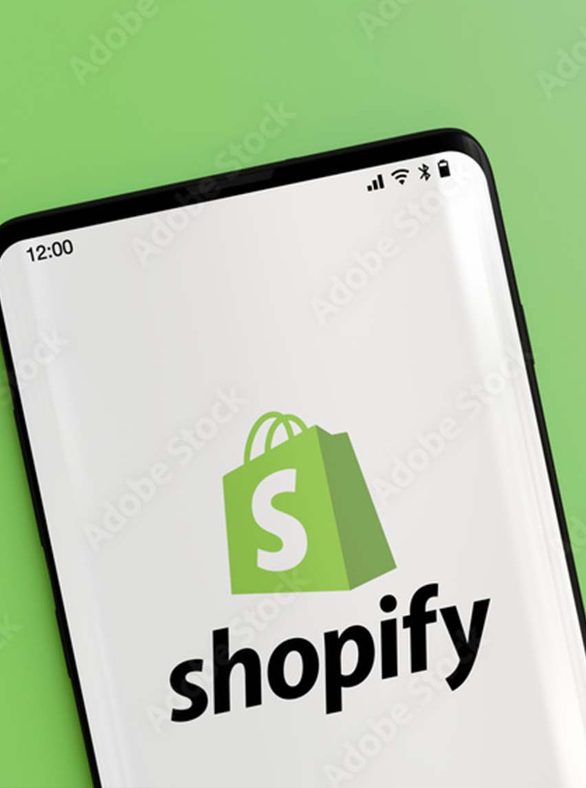 Shopify logo on cell phone screen