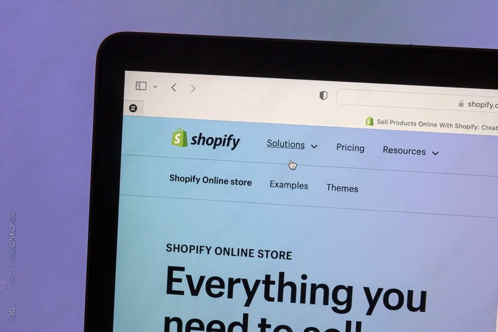 A tablet display that shows a Shopify store.